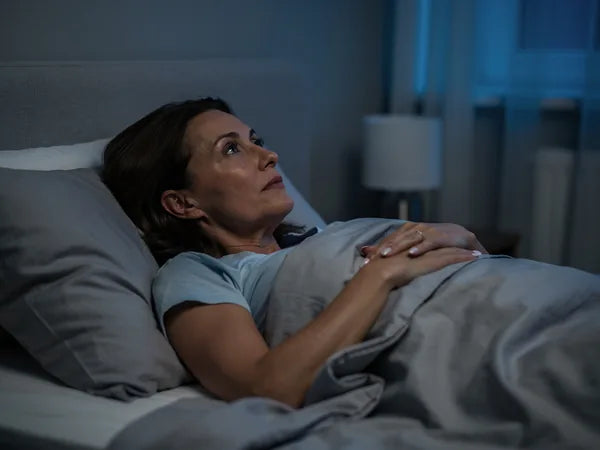 A woman awake at 3AM